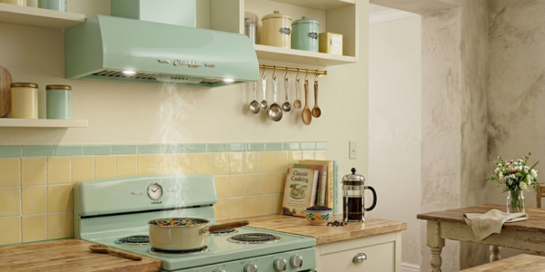 Unique Appliances Classic Retro Range Hood in Summer Mint Green installed above a stove in a vintage-style kitchen