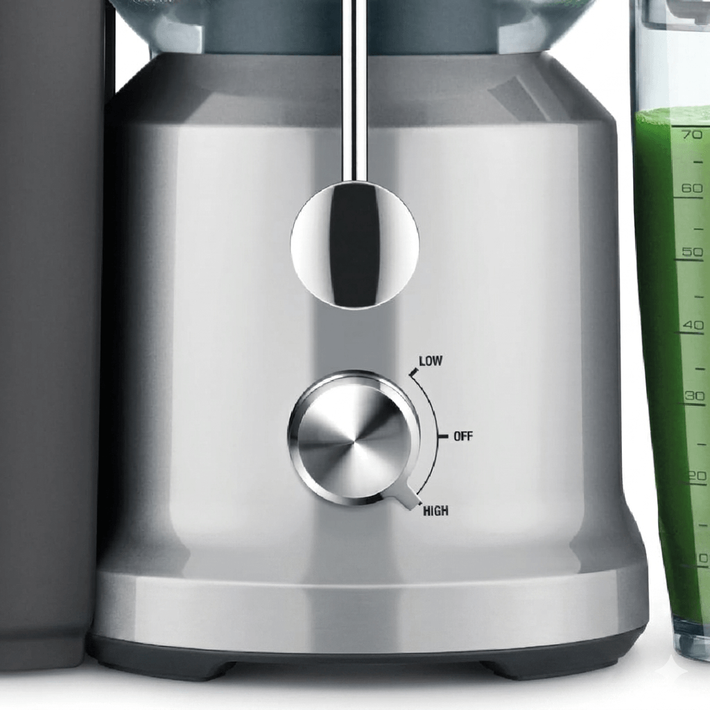 Close-up of the Breville BJE430SIL's stainless steel precision mesh filter and wide feed chute.